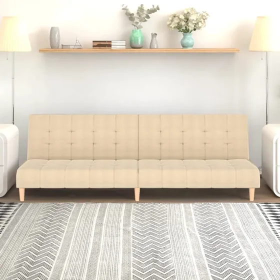 2-personers sovesofa i creme stof (omdannes til seng)