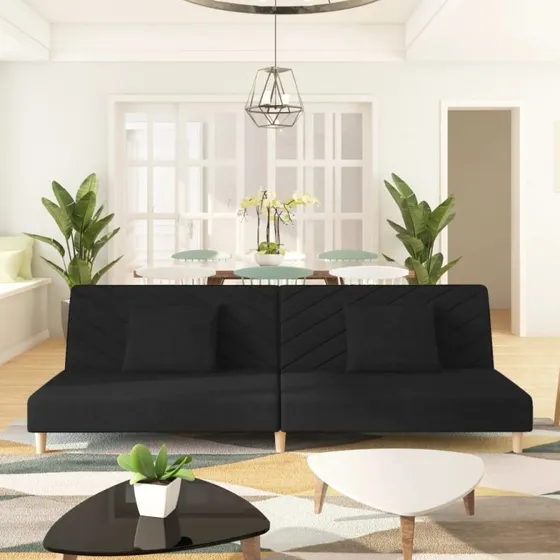 2-personers sovesofa i sort stof med 2 puder