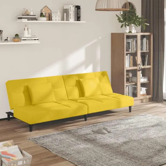 2-personers sovesofa i gul velour med 2 puder