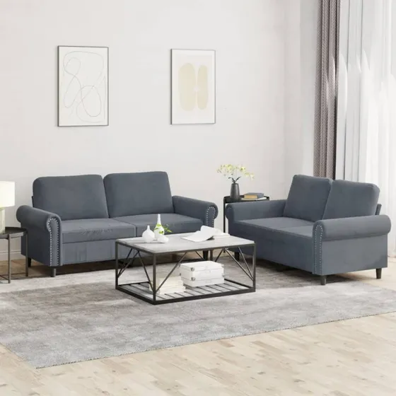 2-personers sofasæt i mørkegrå velour med hynder