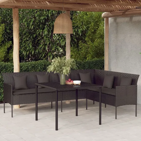 L-formet havesofa i sort polyrattan med hynder