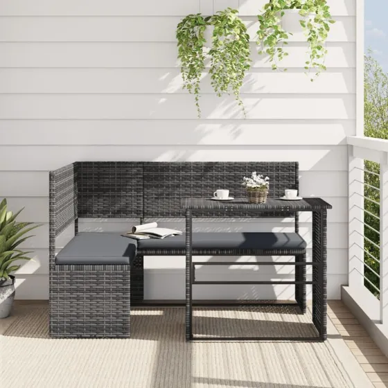 L-formet havesofa i polyrattan med bord og hynder, grå