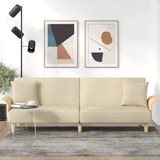 Creme sovesofa med armlæn og justerbart ryglæn