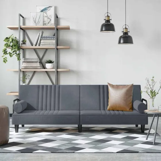 Sovesofa i mørkegrå velour med armlæn