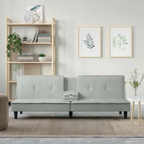 Sovesofa i lysegrå velour med kopholdere
