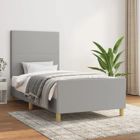 Sengeramme 100x200 cm i lysegråt stof med polstret gavl