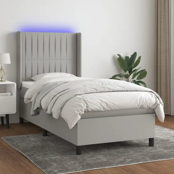 Kontinentalseng 100x200 cm i lysegråt stof med LED-lys