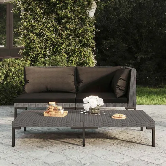 Havesofa i halvrundt polyrattan med hynder