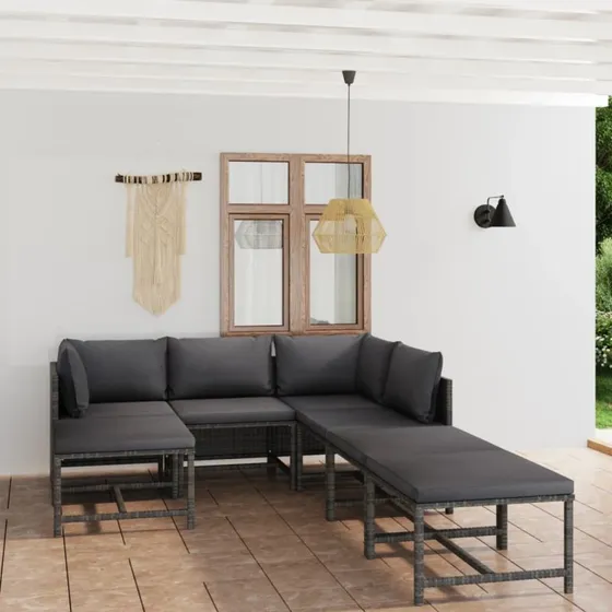 7-dele loungesæt i grå polyrattan med hynder