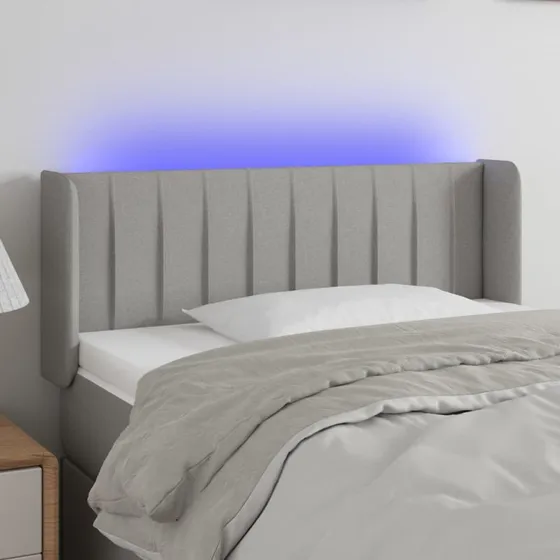 vidaXL sengegavl med LED-lys 83x16x78/88 cm lysegrå stof