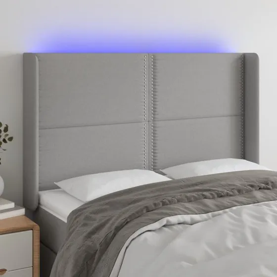vidaXL sengegavl med LED-lys 147x16x118/128 cm stof lysegrå