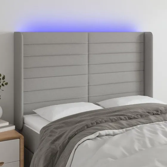vidaXL Sengegavl med LED 147x16x118/128 cm lysegrå stof