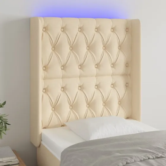 vidaXL Sengegavl med LED-lys 83x16x118/128 cm stof cremefarvet