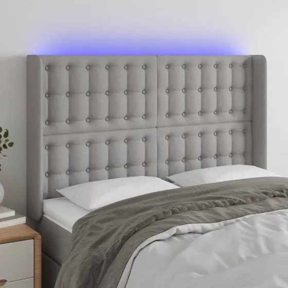 vidaXL sengegavl med LED-lys 147x16x118/128 cm stof lysegrå