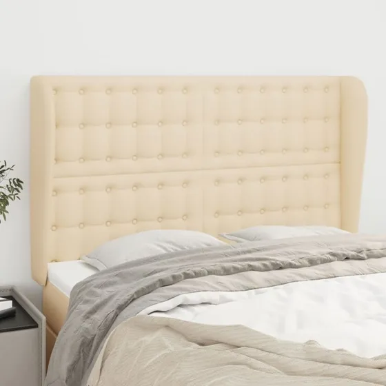 vidaXL sengegavl med kanter 147x23x118/128 cm stof cremefarvet