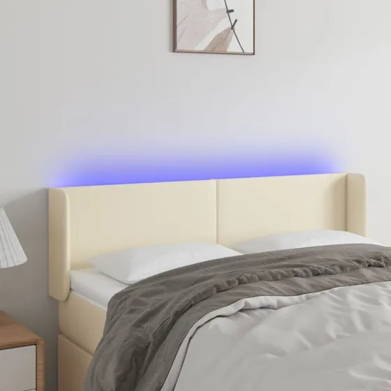 vidaXL Sengegavl med LED-lys 147x16x78/88 cm cremefarvet kunstlæder