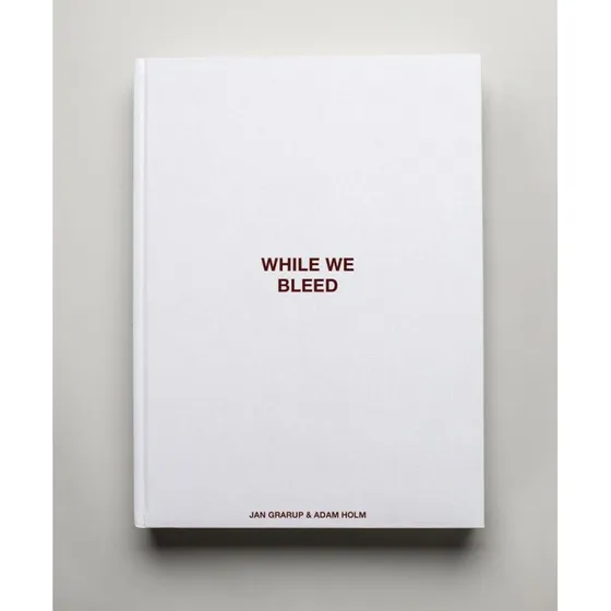 While We Bleed - Limited Edition af Jan Grarup & Adam Holm