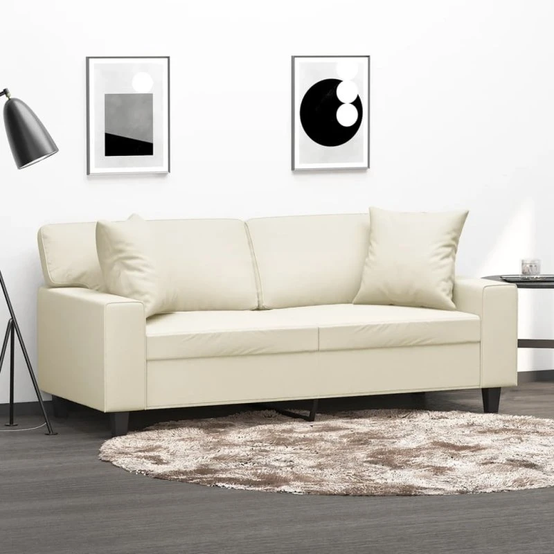 2-personers sofa 140 cm i creme kunstlæder med pyntepuder