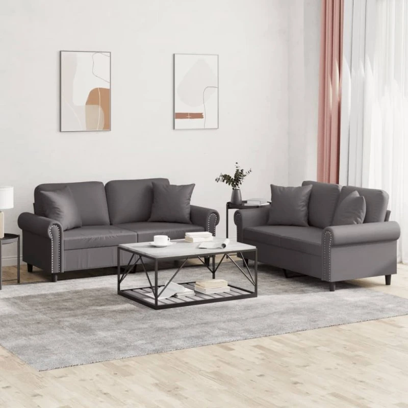 Sofasæt 2-dele i gråt kunstlæder med puder