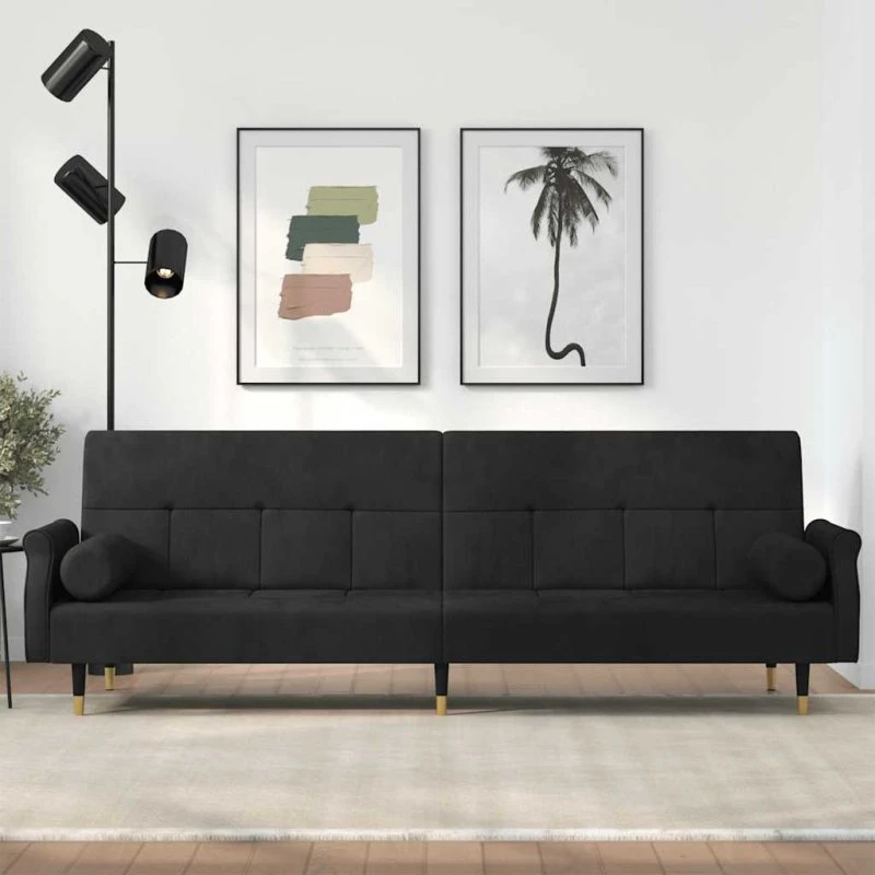 Sovesofa i sort velour med hynder