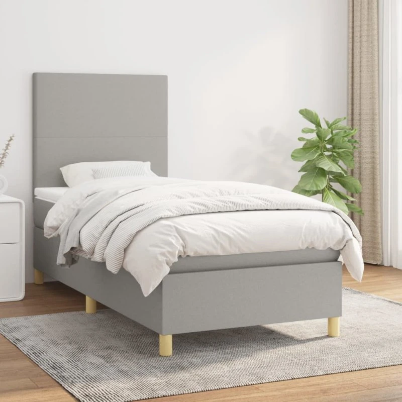 Kontinentalseng 90x200 cm i lysegråt stof med pocketmadras
