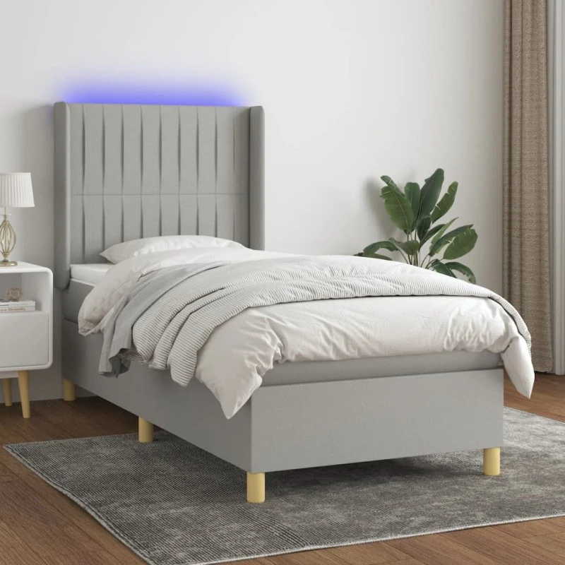 Kontinentalseng 90x200 cm i lysegråt stof med LED-lys