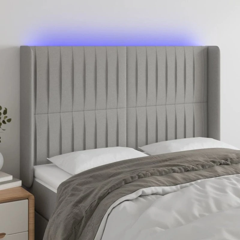 vidaXL sengegavl med LED 147x16x118/128 cm stof lysegrå