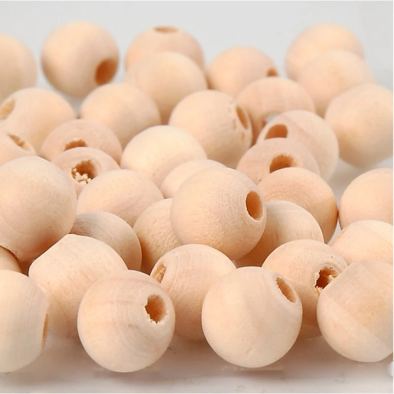 Træperler ø10 mm, hul 2,5 mm - 40 stk.