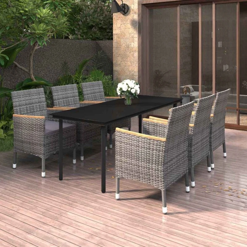 vidaXL 7-deligt havemøbelsæt i grå polyrattan med glasbord og mørkegrå hynder
